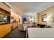 Charming bedroom featuring a kitchenette, seating area, and modern amenities, creating a comfortable and convenient living space at 2000 Fashion Show Dr # 5509, Las Vegas, NV 89109