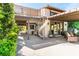 Expansive backyard with covered patio, spiral staircase, and ample space for outdoor entertaining at 2017 Plaza De Cielo, Las Vegas, NV 89102