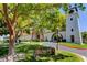 Well-maintained community grounds with mature trees, lush lawns, and scenic walkways at 2017 Plaza De Cielo, Las Vegas, NV 89102