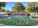 Beautiful Spanish Oaks community sign with a flower bed in the front at 2017 Plaza De Cielo, Las Vegas, NV 89102