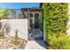 Gated entrance with lush landscaping, creating a welcoming first impression at 2017 Plaza De Cielo, Las Vegas, NV 89102