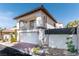 Attractive two-story house with a balcony, tile roof, and attached garage, set in a well-kept neighborhood at 2017 Plaza De Cielo, Las Vegas, NV 89102