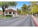 Exterior of a charming tile roof gate house at the entrance to a residential community at 2017 Plaza De Cielo, Las Vegas, NV 89102