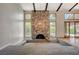 Spacious living room with stone fireplace and lots of natural light at 2017 Plaza De Cielo, Las Vegas, NV 89102