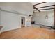 Spacious living room with fireplace, bar, and wood floors at 2017 Plaza De Cielo, Las Vegas, NV 89102
