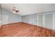 Bright living room features hardwood floors, a ceiling fan, and patio access for added convenience at 2017 Plaza De Cielo, Las Vegas, NV 89102