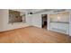 Open living room with wood floors, bar, and natural light at 2017 Plaza De Cielo, Las Vegas, NV 89102