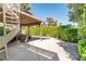Lush pool area offers a relaxing retreat with a covered patio and mature, privacy landscaping at 2017 Plaza De Cielo, Las Vegas, NV 89102