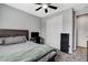 Neutral bedroom with carpet, ceiling fan, closet and gray walls offers a serene, comfortable space at 2115 Noble Perch St, Las Vegas, NV 89138