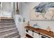 Entryway showcasing stairs, neutral paint, modern art, and decorative display pieces at 2115 Noble Perch St, Las Vegas, NV 89138