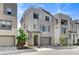 Contemporary two-story home featuring modern architecture and a gray exterior at 2115 Noble Perch St, Las Vegas, NV 89138