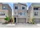 Modern two-story home with a two-car garage and minimalistic landscaping at 2115 Noble Perch St, Las Vegas, NV 89138
