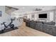Spacious living area with stairs and view into the kitchen at 2115 Noble Perch St, Las Vegas, NV 89138