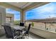 Outdoor patio with seating area showcasing scenic mountain views and neighborhood landscape at 2115 Noble Perch St, Las Vegas, NV 89138