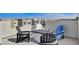 Charming rooftop deck with Adirondack chairs and a modern fire pit, perfect for relaxing at 2115 Noble Perch St, Las Vegas, NV 89138