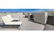 Relaxing rooftop patio with lounge chairs and outdoor seating area for gatherings at 2115 Noble Perch St, Las Vegas, NV 89138