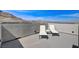 Stunning rooftop deck with lounge chairs, ideal for enjoying panoramic mountain views at 2115 Noble Perch St, Las Vegas, NV 89138