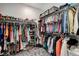 Spacious walk-in closet providing ample storage space for clothing and accessories at 2115 Noble Perch St, Las Vegas, NV 89138