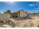 Backyard needing work with outbuilding and block wall fencing at 2301 Cambridge Elms St, North Las Vegas, NV 89032