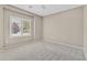 This bedroom features a ceiling fan and natural light from the shuttered window at 2525 Willow Wren Dr, North Las Vegas, NV 89084