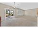 Dining area offers tranquil views of the backyard through sliding glass doors and plantation shutters at 2525 Willow Wren Dr, North Las Vegas, NV 89084
