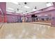 Large mirrored fitness studio with hardwood floors is ideal for dance and exercise at 2525 Willow Wren Dr, North Las Vegas, NV 89084