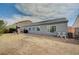 Spacious backyard with grass and a patio at 2712 Peekskill Ave, Henderson, NV 89052