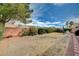 Lush backyard with grass and various plants at 2712 Peekskill Ave, Henderson, NV 89052
