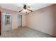Comfortable bedroom with carpet flooring, ceiling fan, and closet at 2712 Peekskill Ave, Henderson, NV 89052