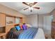 Bedroom with carpet, dresser, TV, and furniture at 2712 Peekskill Ave, Henderson, NV 89052