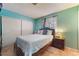 Bedroom with aqua walls, double bed, and closet at 2732 Johannson Ln, Las Vegas, NV 89115
