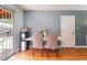 Eat-in dining area with tile floor, light gray walls, table and chairs at 2732 Johannson Ln, Las Vegas, NV 89115
