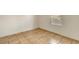This bedroom features tile flooring and a window at 2801 N Rainbow Blvd # 102, Las Vegas, NV 89108