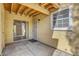 This is a covered patio featuring sliding glass doors and an iron security door at 2801 N Rainbow Blvd # 102, Las Vegas, NV 89108