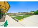 Outdoor bocce ball courts featuring sun shades and vibrant green turf, perfect for leisurely recreation at 2962 Gettysburg Ave, Henderson, NV 89052