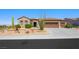 Charming single story home featuring desert landscaping, a three car garage, and a tile roof at 2962 Gettysburg Ave, Henderson, NV 89052