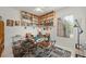 Game room with ceiling fan, built in bookcases, and a Mahjong table set for play at 2962 Gettysburg Ave, Henderson, NV 89052