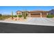 Inviting single-story home with a three-car garage and desert landscaping at 2962 Gettysburg Ave, Henderson, NV 89052