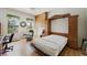 Office with Murphy bed, built in storage, and a bright window with backyard views at 2962 Gettysburg Ave, Henderson, NV 89052