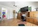 Office featuring built-in bookshelves, storage, and a large desk space with backyard views at 2962 Gettysburg Ave, Henderson, NV 89052