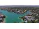 Aerial view of luxury homes in lakeside community with lush landscaping and waterways at 3000 Waterview Dr, Las Vegas, NV 89117