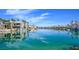 Scenic lakefront community with beautiful waterfront homes, palm trees, and stunning blue skies at 3000 Waterview Dr, Las Vegas, NV 89117