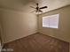 This bedroom is bright with neutral walls and a large window at 3012 Silver Canyon Ln, North Las Vegas, NV 89031