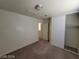 A spacious bedroom features a double door closet and neutral carpeting at 3012 Silver Canyon Ln, North Las Vegas, NV 89031