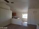 Open-concept living area with views into the dining area and kitchen at 3012 Silver Canyon Ln, North Las Vegas, NV 89031