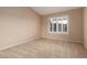 Bedroom with large windows offering great natural light and carpet at 3032 Bonnie Rock Dr, Las Vegas, NV 89134