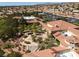 Aerial view of community center featuring lush landscape, and ample parking at 3032 Bonnie Rock Dr, Las Vegas, NV 89134