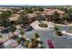 Overhead image of the community entrance with circular drive and flag display at 3032 Bonnie Rock Dr, Las Vegas, NV 89134