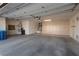 Spacious garage with built-in storage and room for multiple vehicles at 3032 Bonnie Rock Dr, Las Vegas, NV 89134