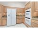 Bright kitchen with modern appliances, granite countertops, and custom cabinetry at 3032 Bonnie Rock Dr, Las Vegas, NV 89134